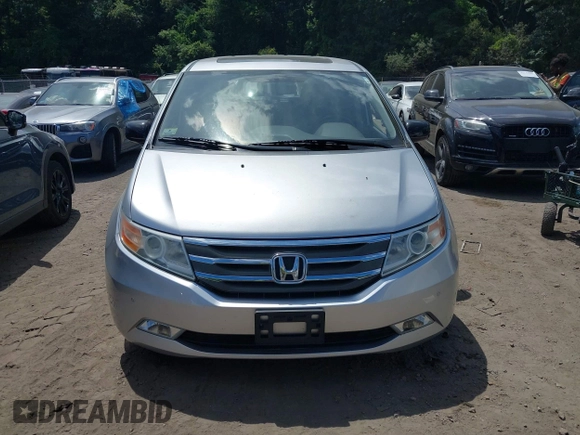 2012 Honda Odyssey Touring with VIN 5FNRL5H9XCB026741, listed as a IAAI auction lot 42808245 with 293,422 mi miles and . Bid and sale history available at DreamBid. Image 6.