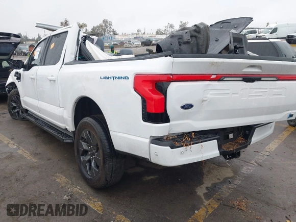 2023 Ford F-150 Lightning Pro with VIN 1FT6W1EV8PWG05765, listed as a IAAI auction lot 41461450 with Not Provided miles and . Bid and sale history available at DreamBid. Image 3.