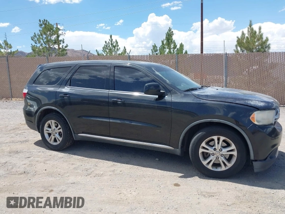 2012 Dodge Durango SXT with VIN 1C4RDJAG0CC206726, listed as a IAAI auction lot 42653653 with 243,337 mi miles and . Bid and sale history available at DreamBid. Image 13.