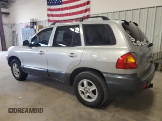 2003 Hyundai Santa Fe GLS z VIN KM8SC13DX3U431975, wystawiony jako Copart lot #56180275 z przebiegiem 239 295 mil mil oraz Czysty tytuł • Clean title. Historia ofert i sprzedaży dostępna na DreamBid. Obrazek 2.