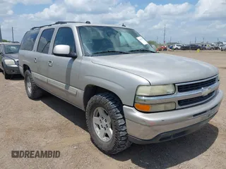 2005 Chevrolet Suburban LS z VIN 3GNEC16ZX5G140284, wystawiony jako IAAI lot #42431121 z przebiegiem 320 910 mil mil oraz . Historia ofert i sprzedaży dostępna na DreamBid. Obrazek 1.