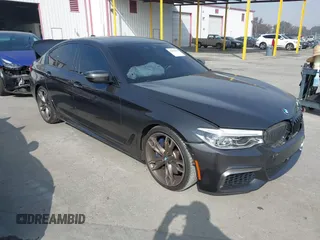 2018 BMW 5 Series M550i xDrive with VIN WBAJB9C57JB286667, listed as a IAAI auction lot 41616264 with 55,482 mi miles. Bid and sale history available at carsss.com. Image 1.