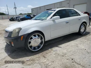 2003 Cadillac CTS with VIN 1G6DM57N530104219, listed as a Copart auction lot 59415505 with 142,557 mi miles and Salvage title. Bid and sale history available at DreamBid. Image 1.