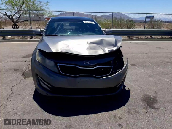 2012 Kia Optima SX z VIN 5XXGR4A60CG044520, wystawiony jako Copart lot #56013155 z przebiegiem 155 487 mil mil oraz Szkoda całkowita • Salvage title. Historia ofert i sprzedaży dostępna na DreamBid. Obrazek 11.