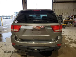 2013 Jeep Grand Cherokee Overland with VIN 1C4RJFCT5DC599866, listed as a Copart auction lot 51837395 with 105,521 mi miles and Salvage Title. Bid and sale history available at carsss.com. Image 6.