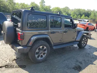 2018 Jeep Wrangler Unlimited Sahara with VIN 1C4HJXEGXJW229881, listed as a Copart auction lot 58762775 with 82,470 mi miles and Salvage title. Bid and sale history available at DreamBid. Image 3.