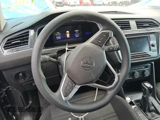2023 Volkswagen Tiguan S z VIN 3VVRB7AX4PM043335, wystawiony jako Copart lot #59045145 z przebiegiem 31 659 mil mil oraz Szkoda całkowita • Salvage title. Historia ofert i sprzedaży dostępna na DreamBid. Obrazek 9.
