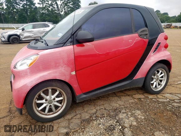 2009 Smart fortwo Pure with VIN WMEEJ31X79K271222, listed as a Copart auction lot 64583695 with 152,626 mi miles and Clean title. Bid and sale history available at DreamBid. Image 1.