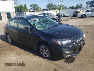 2018 Subaru Impreza Premium with VIN 4S3GTAB68J3739274, listed as a Copart auction lot 62193185 with 58,518 mi miles and Salvage title. Bid and sale history available at DreamBid. Image 4.