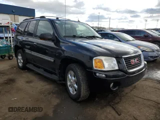 2005 GMC Envoy SLT with VIN 1GKDT13S352366014, listed as a Copart auction lot 43006165 with 126,721 mi miles and Clean Title. Bid and sale history available at carsss.com. Image 4.