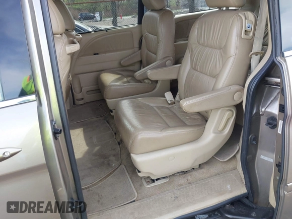 2010 Honda Odyssey EX-L with VIN 5FNRL3H68AB055744, listed as a IAAI auction lot 42107273 with 193,289 mi miles. Bid and sale history available at carsss.com. Image 8.