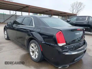 2016 Chrysler 300 Limited with VIN 2C3CCAAG7GH219523, listed as a IAAI auction lot 41932271 with 158,082 mi miles. Bid and sale history available at carsss.com. Image 3.