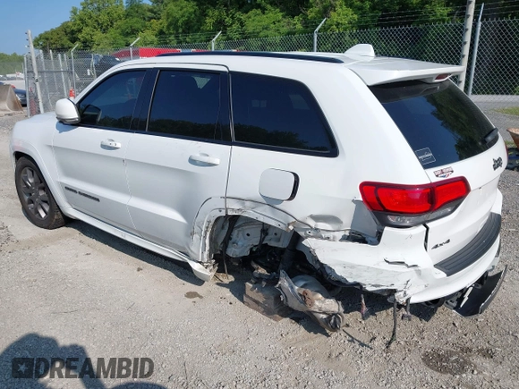 2021 Jeep Grand Cherokee Overland with VIN 1C4RJFCG3MC502165, listed as a IAAI auction lot 42404863 with 100,197 mi miles and . Bid and sale history available at DreamBid. Image 3.