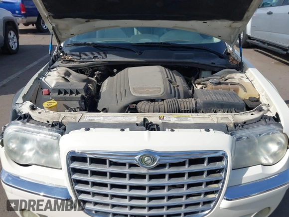2006 Chrysler 300 C with VIN 2C3KA63H06H534666, listed as a IAAI auction lot 41892603 with 116,431 mi miles. Bid and sale history available at carsss.com. Image 10.