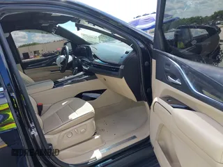 2023 Cadillac Escalade 4WD Premium Luxury with VIN 1GYS4BKL4PR236070, listed as a IAAI auction lot 41905971 with 40,382 mi miles and . Bid and sale history available at DreamBid. Image 5.