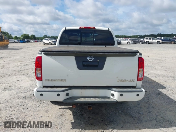 2018 Nissan Frontier SV with VIN 1N6AD0EV0JN744809, listed as a IAAI auction lot 42508839 with 99,049 mi miles and . Bid and sale history available at DreamBid. Image 16.