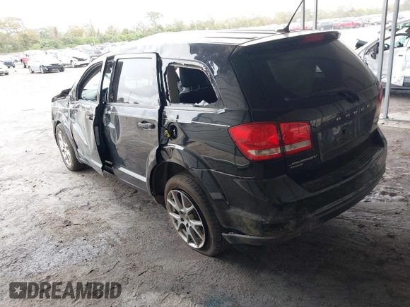 2015 Dodge Journey R/T with VIN 3C4PDDEG3FT555035, listed as a IAAI auction lot 41067936 with 214,244 mi miles and . Bid and sale history available at DreamBid. Image 3.