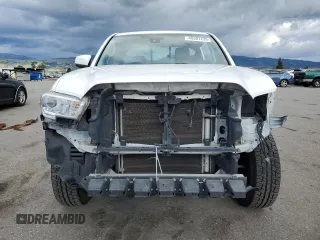 2018 Toyota Tacoma SR z VIN 5TFRX5GN2JX105908, wystawiony jako Copart lot #48301235 z przebiegiem 73 139 mil mil oraz Szkoda całkowita • Salvage title. Historia ofert i sprzedaży dostępna na DreamBid. Obrazek 5.