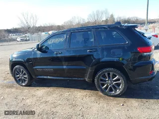 2018 Jeep Grand Cherokee Overland with VIN 1C4RJFCG1JC334098, listed as a IAAI auction lot 41708642 with 50,980 mi miles. Bid and sale history available at carsss.com. Image 14.
