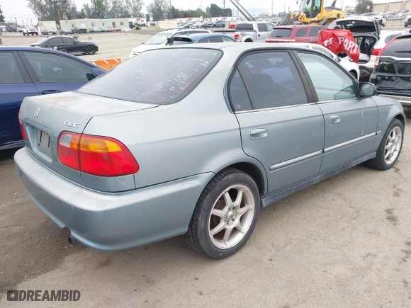 2000 Honda Civic VP with VIN 2HGEJ6613YH573635, listed as a IAAI auction lot 42099695 with 235,772 mi miles. Bid and sale history available at carsss.com. Image 4.