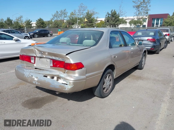 2000 Toyota Camry LE z VIN JT2BF22K5Y0258522, wystawiony jako IAAI lot #41998874 z przebiegiem 300 186 mil mil oraz . Historia ofert i sprzedaży dostępna na DreamBid. Obrazek 4.