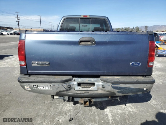 2006 Ford Super Duty F-250 XL with VIN 1FTSX20P86EC17580, listed as a Copart auction lot 87915715 with 144,535 mi miles and Salvage Title. Bid and sale history available at carsss.com. Image 6.