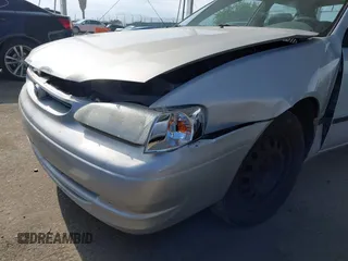 2000 Toyota Corolla VE with VIN 1NXBR12E6YZ393077, listed as a IAAI auction lot 42111914 with 181,056 mi miles and . Bid and sale history available at DreamBid. Image 6.