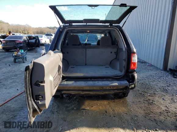 2003 Isuzu Rodeo with VIN 4S2CK58W334306303, listed as a Copart auction lot 83820444 with 180,040 mi miles and Salvage Title. Bid and sale history available at DreamBid. Image 6.