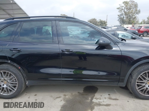 2014 Porsche Cayenne with VIN WP1AA2A29ELA97300, listed as a IAAI auction lot 42106931 with 156,129 mi miles and . Bid and sale history available at DreamBid. Image 14.