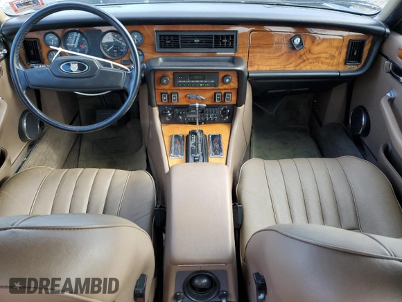 1986 Jaguar XJ z VIN SAJAV1341GC458926, wystawiony jako Copart lot #73985024 z przebiegiem 73 337 mil mil oraz Czysty tytuł • Clean title. Historia ofert i sprzedaży dostępna na DreamBid. Obrazek 8.