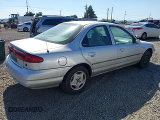 1999 Ford Contour with VIN 1FAFP653XXK167515, listed as a IAAI auction lot 42745231 with 144,236 mi miles and . Bid and sale history available at DreamBid. Image 4.