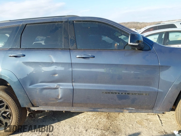 2021 Jeep Grand Cherokee 80th Anniversary with VIN 1C4RJFBG5MC827059, listed as a IAAI auction lot 40958909 with 38,000 mi miles and . Bid and sale history available at DreamBid. Image 13.