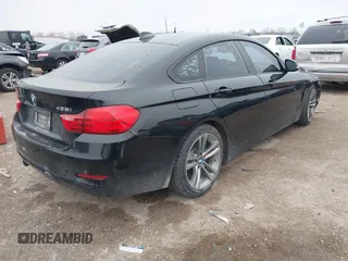 2015 BMW 4 Series 428i with VIN WBA4A9C54FD416870, listed as a IAAI auction lot 41593977 with 99,314 mi miles and . Bid and sale history available at DreamBid. Image 4.