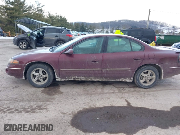2001 Pontiac Bonneville SE z VIN 1G2HX54K914293726, wystawiony jako IAAI lot #41373612 z przebiegiem 120 117 mil mil oraz . Historia ofert i sprzedaży dostępna na DreamBid. Obrazek 14.