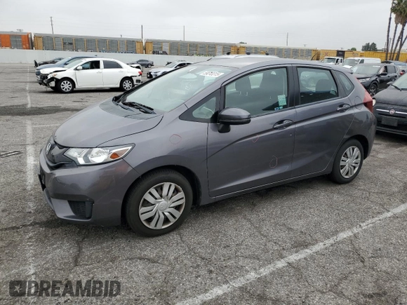 2015 Honda Fit LX z VIN 3HGGK5H58FM785137, wystawiony jako Copart lot #59013315 z przebiegiem 84 592 mil mil oraz Szkoda całkowita • Salvage title. Historia ofert i sprzedaży dostępna na DreamBid. Obrazek 1.