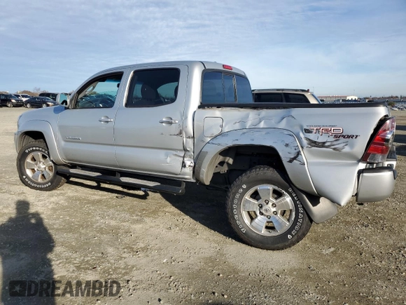 2011 Toyota Tacoma PreRunner with VIN 3TMJU4GN7BM114871, listed as a Copart auction lot 87256214 with 214,236 mi miles and Salvage Title. Bid and sale history available at DreamBid. Image 2.