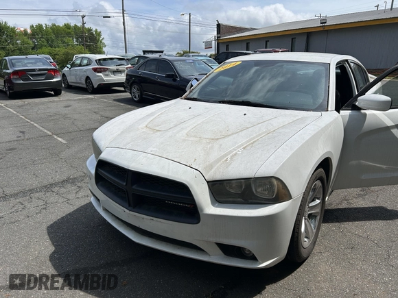 2014 Dodge Charger SE with VIN 2C3CDXBG8EH187998, listed as a IAAI auction lot 42175958 with 135,388 mi miles and . Bid and sale history available at carsss.com. Image 2.