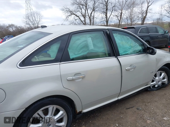 2008 Mercury Sable Premier z VIN 1MEHM43W58G601548, wystawiony jako IAAI lot #41843679 z przebiegiem 62 196 mil mil oraz . Historia ofert i sprzedaży dostępna na DreamBid. Obrazek 13.