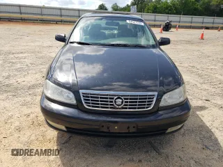 2000 Cadillac Catera z VIN W06VR54R0YR011736, wystawiony jako Copart lot #54927395 z przebiegiem 45 892 mil mil oraz Szkoda całkowita • Salvage title. Historia ofert i sprzedaży dostępna na DreamBid. Obrazek 5.