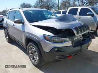2021 Jeep Cherokee Trailhawk z VIN 1C4PJMBX0MD231122, wystawiony jako IAAI lot #41760387 z przebiegiem 50 789 mil mil oraz . Historia ofert i sprzedaży dostępna na DreamBid. Obrazek 1.