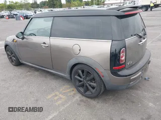 2013 MINI Clubman z VIN WMWZF3C56DT490749, wystawiony jako IAAI lot #42368888 z przebiegiem 163 731 mil mil oraz . Historia ofert i sprzedaży dostępna na DreamBid. Obrazek 3.