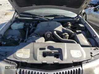 1999 Lincoln Town Car Signature z VIN 1LNHM82W7XY626305, wystawiony jako Copart lot #58009475 z przebiegiem Nie podano mil oraz Szkoda całkowita • Salvage title. Historia ofert i sprzedaży dostępna na DreamBid. Obrazek 11.
