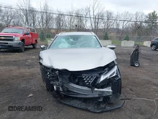 2019 Lexus UX 250h z VIN JTHU9JBH9K2008345, wystawiony jako IAAI lot #42019642 z przebiegiem Nie podano mil oraz . Historia ofert i sprzedaży dostępna na DreamBid. Obrazek 11.