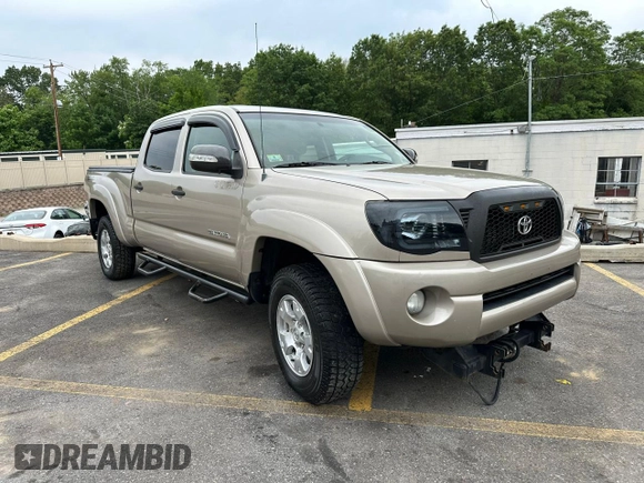 2005 Toyota Tacoma with VIN 5TEMU52N65Z129119, listed as a Copart auction lot 61149515 with 203,508 mi miles and Clean title. Bid and sale history available at DreamBid. Image 4.