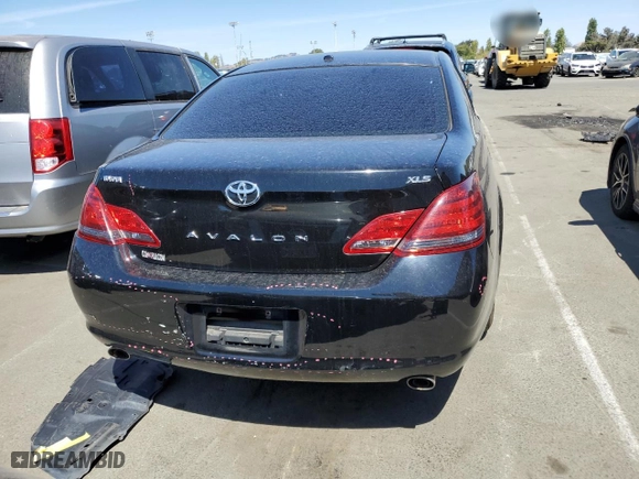 2010 Toyota Avalon XL with VIN 4T1BK3DB0AU358074, listed as a Copart auction lot 68949064 with 144,429 mi miles and Salvage Title. Bid and sale history available at carsss.com. Image 6.