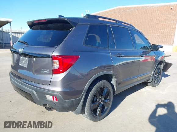 2019 Honda Passport Elite z VIN 5FNYF8H07KB015720, wystawiony jako IAAI lot #41221298 z przebiegiem 65 747 mil mil oraz . Historia ofert i sprzedaży dostępna na DreamBid. Obrazek 4.