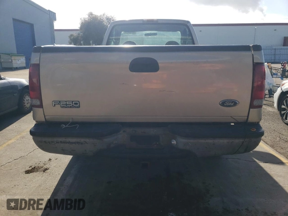 1999 Ford Super Duty F-250 XL with VIN 1FTNF20L3XED27810, listed as a Copart auction lot 80164574 with 162,996 mi miles and Clean Title. Bid and sale history available at carsss.com. Image 6.