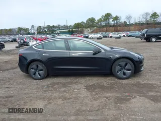 2019 Tesla Model 3 Mid Range with VIN 5YJ3E1EA2KF395549, listed as a IAAI auction lot 41895977 with 97,108 mi miles and . Bid and sale history available at carsss.com. Image 13.