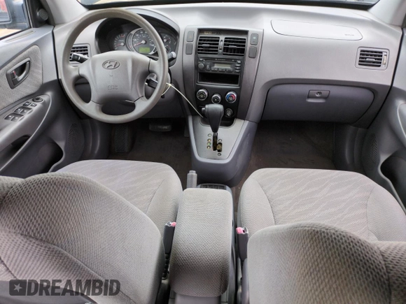 2005 Hyundai Tucson GL with VIN KM8JM12BX5U071182, listed as a Copart auction lot 74852974 with 74,235 mi miles and Salvage Title. Bid and sale history available at carsss.com. Image 8.