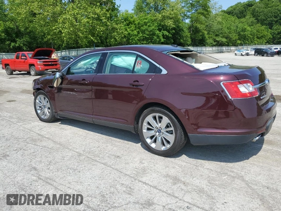 2011 Ford Taurus Limited with VIN 1FAHP2FW6BG157070, listed as a Copart auction lot 59300415 with 143,314 mi miles and Salvage title. Bid and sale history available at DreamBid. Image 2.